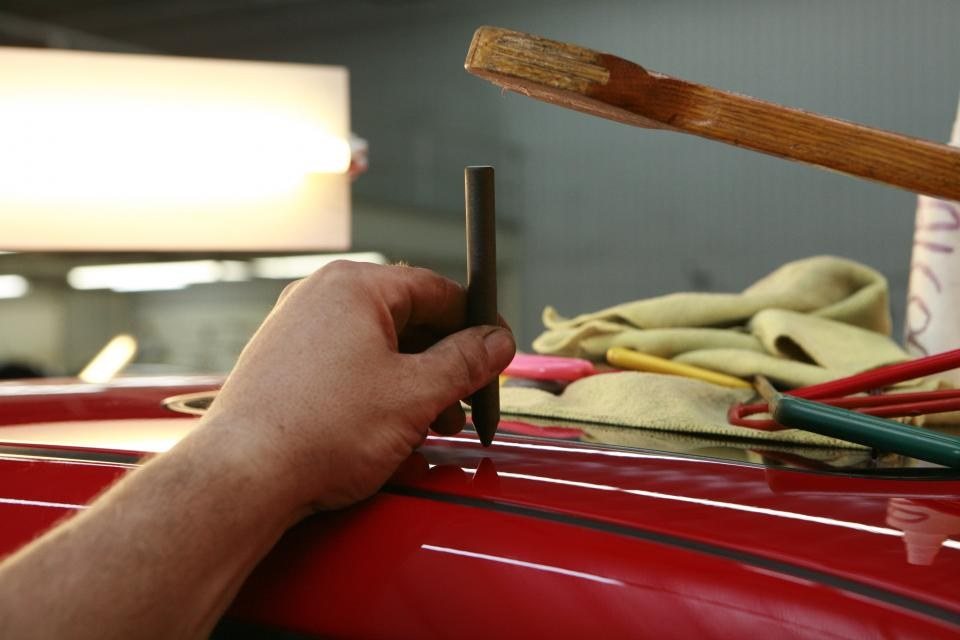 Mechanic working on a car